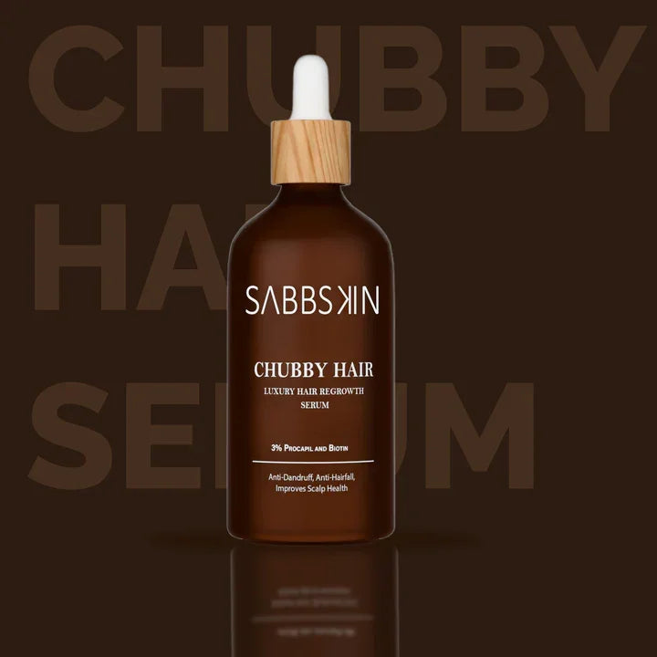 Sabbskin Chubby Hair luxury hair regrowth serum brown bottle with dropper on brown background